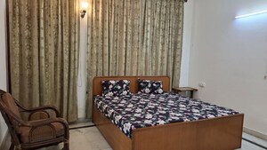 Bedroom in 3 BHK Builder Floor at Nehru Enclave – for Rent