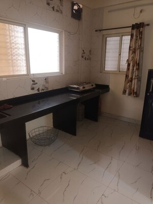 Kitchen in 2 BHK Apartment at Wadgaon Sheri – for Rent