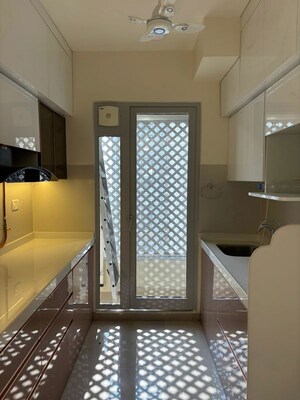 Kitchen in 2 BHK Apartment at Piramal Vaikunth, Balkum Pada – for Rent