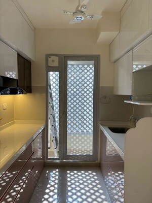 Kitchen in 2 BHK Apartment at Piramal Vaikunth, Balkum Pada – for Rent