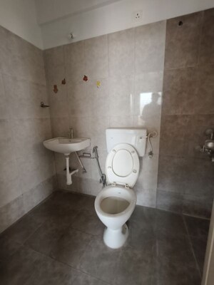 Bathroom in 3 BHK Apartment at Kolte Patil Margosa Heights, Mohammadwadi – for Rent