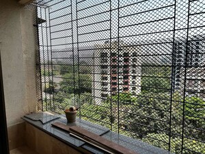 Balcony in 2 BHK Apartment at Nilgiri Upvan CHS, Gawand Baug – for Rent