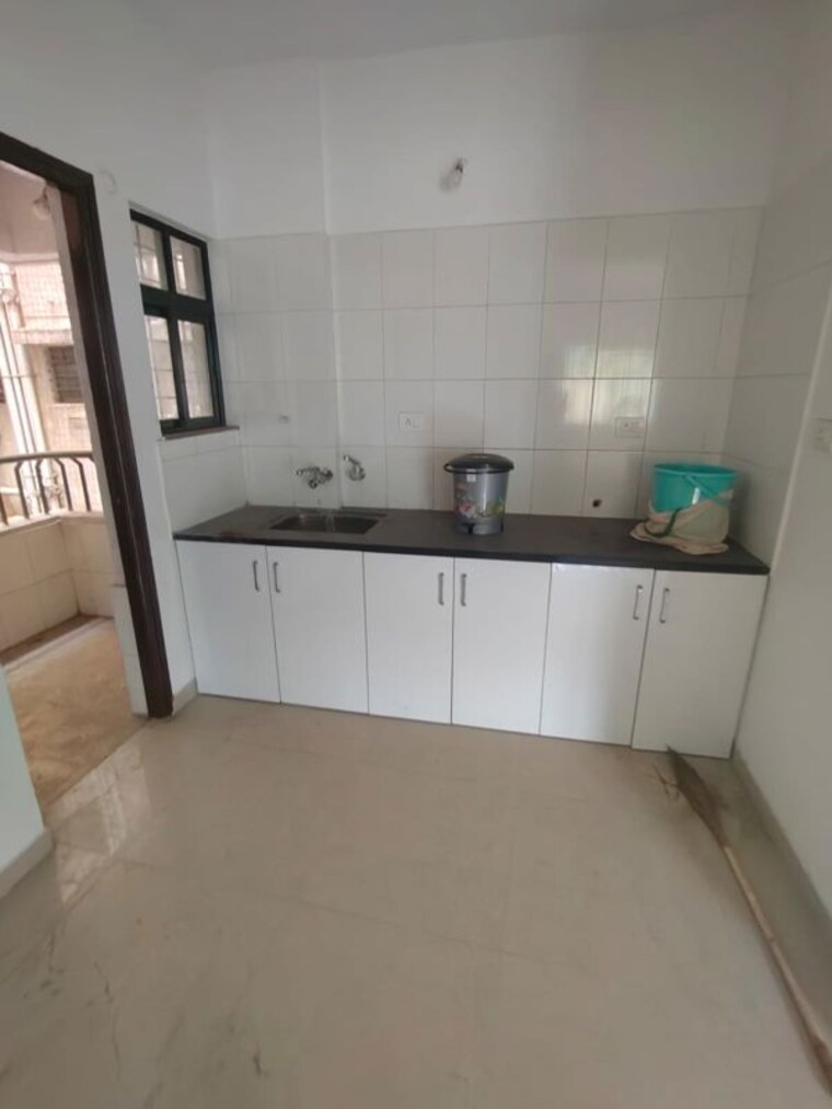 Kitchen, shagun-sunshine-hills 2 Bedroom 1100 Sq.Ft. Apartment In Pisoli Pune 10186306