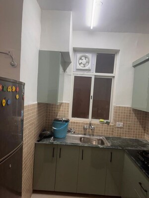 Kitchen in 2 BHK Apartment at Jaypee Green Wish town Klassic, Sector 134 – for Rent