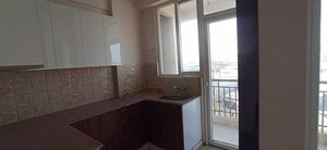 Kitchen in 2 BHK Apartment at Amrapali Golf Homes, Sector 4 Greater Noida – for Rent