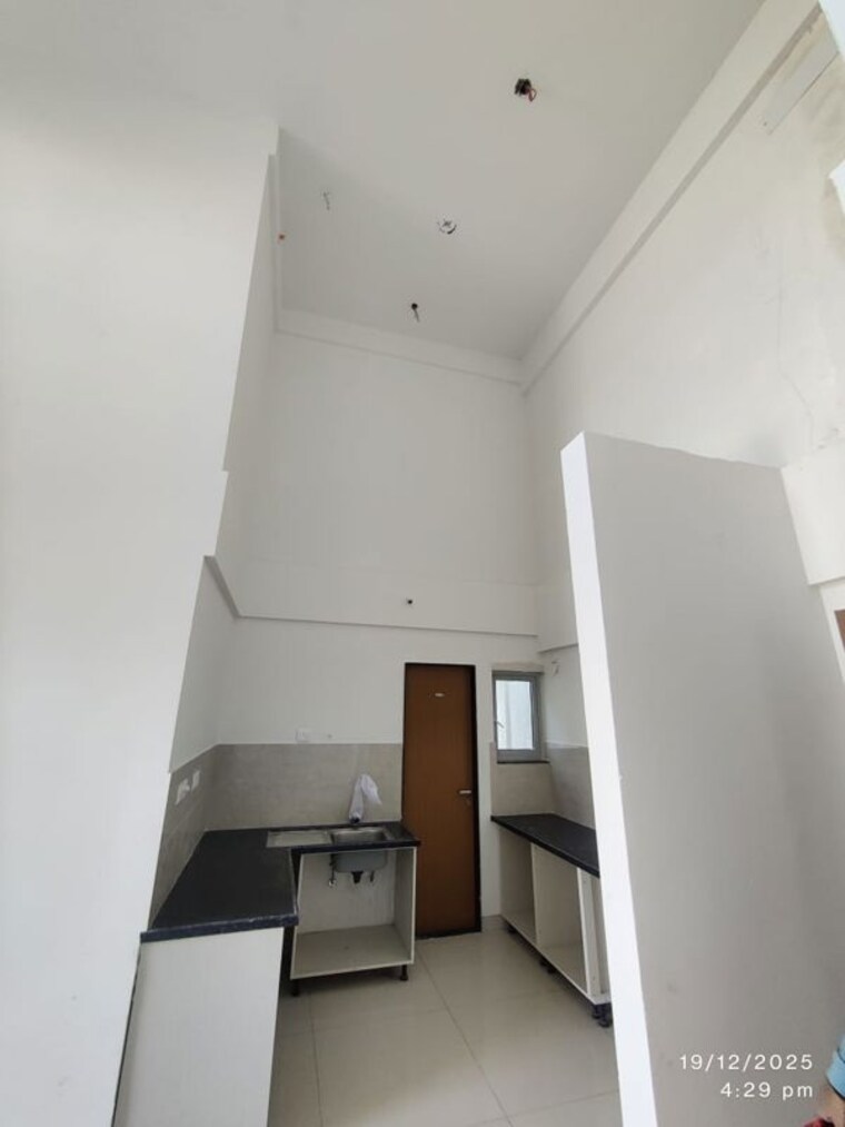 Kitchen, gera-planet-of-joy 2 Bedroom 1200 Sq.Ft. Apartment In Kharadi Pune 10122392