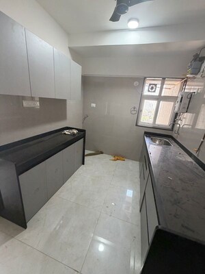 Kitchen in 2 BHK Apartment at Vaibhavlaxmi Queens Glory, Chembur – for Rent