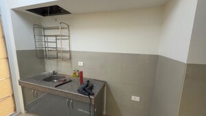 Kitchen in 3.5 BHK Apartment at Emaar Palm Hills, Sector 77 – for Rent