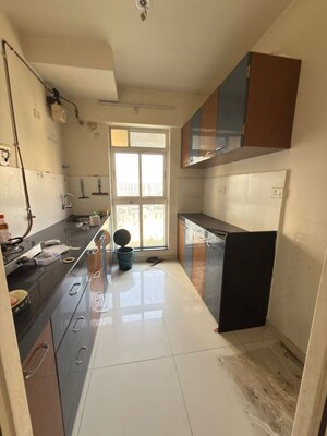 Kitchen in 1.5 BHK Apartment at Godrej Emerald, Ghodbunder Road – for Rent
