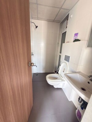Bathroom in 1.5 BHK Apartment at Godrej Emerald, Ghodbunder Road – for Rent