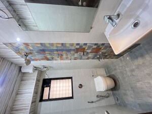 Bathroom in 3 BHK Apartment at Atharva Laxmi Narayan Mansion, Borivali East – for Rent