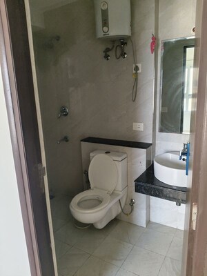 Bathroom in 3 BHK Apartment at Shapoorji Pallonji Joyville Phase 2, Sector 102 – for Rent