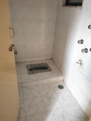 Bathroom in 1 BHK Apartment at Simran Orchid, Salunkhe Vihar Society – for Rent