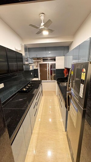 Kitchen in 2 BHK Apartment at Serenity Heights, Malad West – for Rent