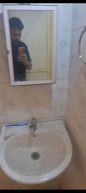 Bathroom in 2 BHK Apartment at Hyde Park Galaxy, Manpada – for Rent