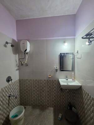 Bathroom in 2 BHK Apartment at Dheeraj Solitaire, Malad West – for Rent