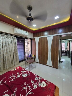 Bedroom in 2 BHK Apartment at Dheeraj Solitaire, Malad West – for Rent