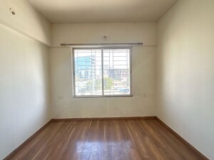 Room in 2 BHK Apartment at Gera Park View, Kharadi – for Rent