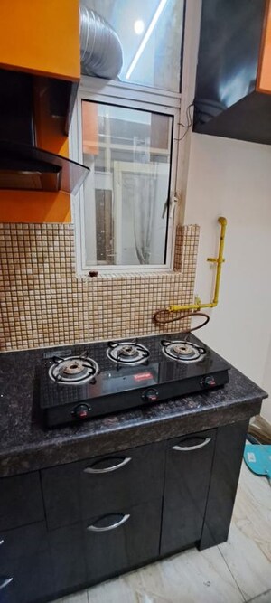 Kitchen in 2 BHK Apartment at Divyansh Flora, Sector 16c Greater Noida – for Rent