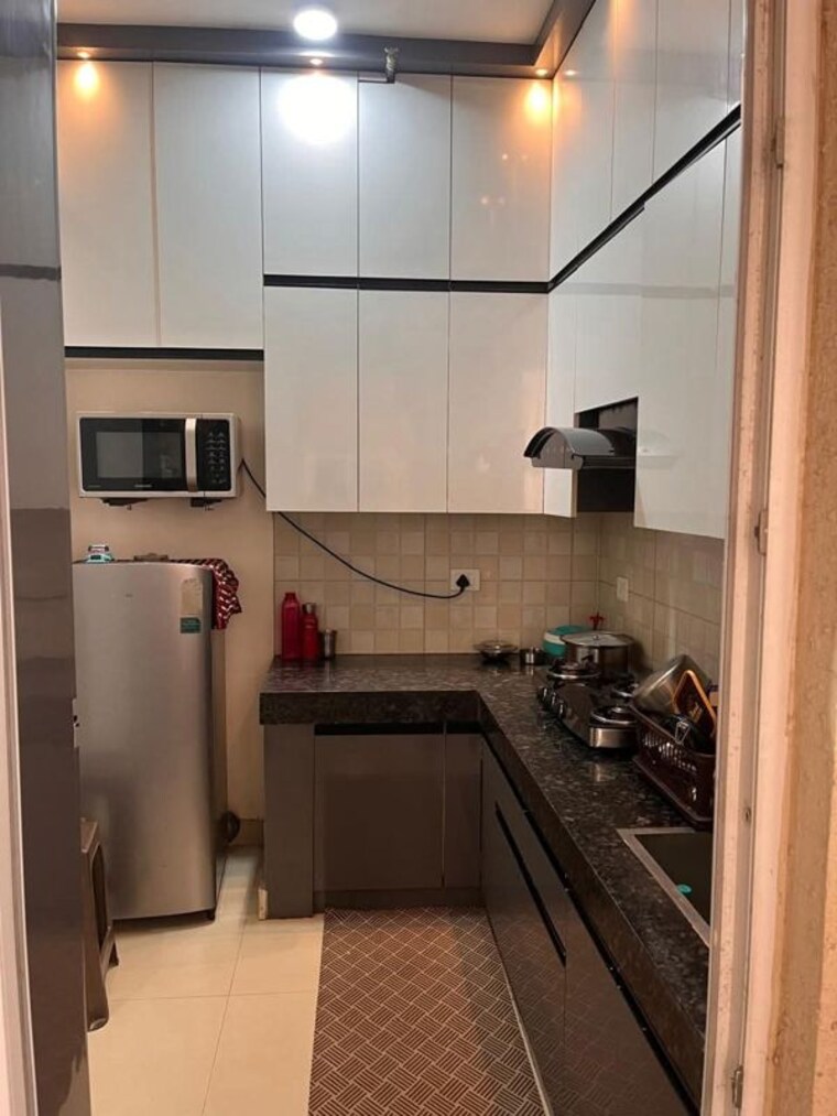 Kitchen, galaxy-north-avenue 2.5 Bedroom 1200 Sq.Ft. Apartment In Gaur City 1 Greater Noida 10189068