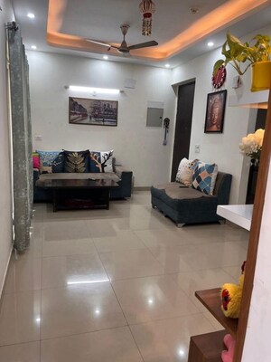 Living Room in 2.5 BHK Apartment at Galaxy North Avenue, Gaur City 1 – for Rent