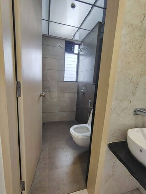 Bathroom in 3 BHK Apartment at Bhumkar Rajanigandha Sakshi Heights, Narhe – for Rent