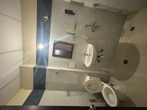 Bathroom in 3 BHK Apartment at Kingswood Court, Sain Vihar – for Rent