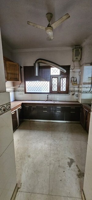 Kitchen in 3 BHK Apartment at Panchsheel Enclave – for Rent