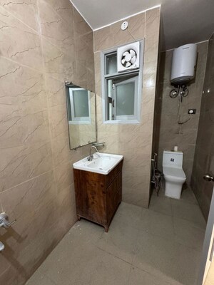 Bathroom in 2 BHK Builder Floor at Chattarpur – for Rent
