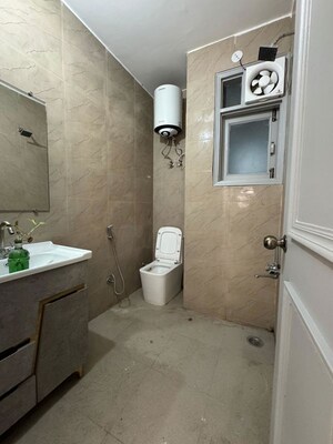 Bathroom in 2 BHK Builder Floor at Chattarpur – for Rent