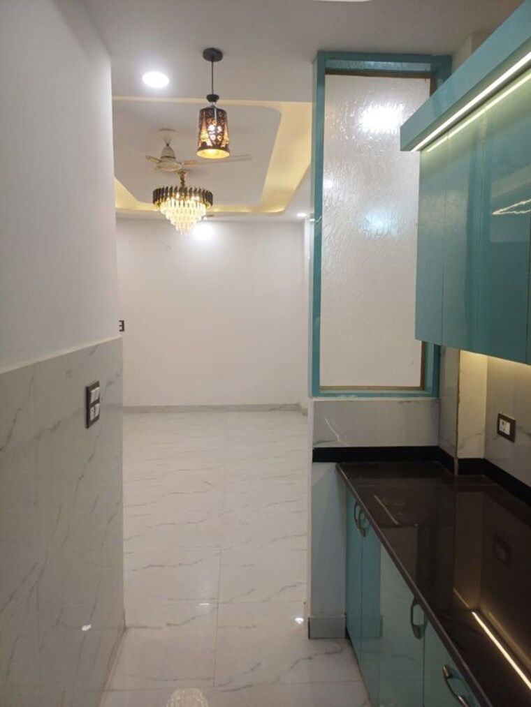 Kitchen, golden-wave-dwarika-city 3 Bedroom 1250 Sq.Ft. Builder Floor In Chithara Greater Noida 10189550