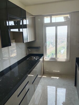 Kitchen in 1 BHK Apartment at Kasturi Avenue CHS, Bhayandar East – for Sale