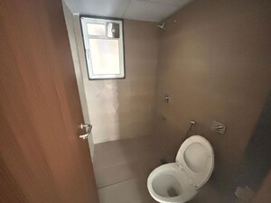 Bathroom in 2 BHK Apartment at Pride Purple Park Titan, Hinjewadi – for Rent