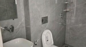 Bathroom in 3 BHK Apartment at Omega Windsor Greens, Faizabad Road – for Rent