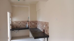 Kitchen in Studio Apartment at Puravankara Silversands, Mundhwa – for Rent