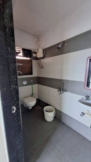 Bathroom in 2 BHK Apartment at Satyam CHS Goregaon West, Goregaon West – for Rent