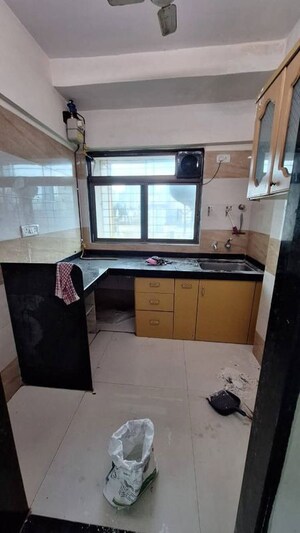 Kitchen in 2 BHK Apartment at Satyam CHS Goregaon West, Goregaon West – for Rent