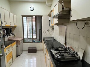 Kitchen in 2.5 BHK Apartment at Oberoi Realty Woods, Goregaon East – for Rent