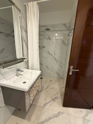 Bathroom in 4 BHK Builder Floor at Sector 48 – for Rent