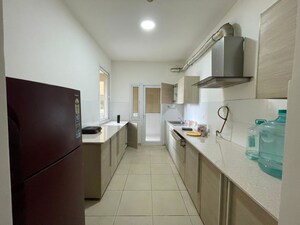 Kitchen in 3 BHK Apartment at Bhartiya Nikoo Homes, Thanisandra Main Road – for Rent