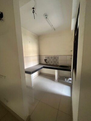 Bathroom in 2 BHK Apartment at Charms Castle, Raj Nagar Extension – for Rent