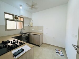 Kitchen in 2 BHK Apartment at Hiranandani Estate Rodas Enclave, Ghodbunder Road – for Rent