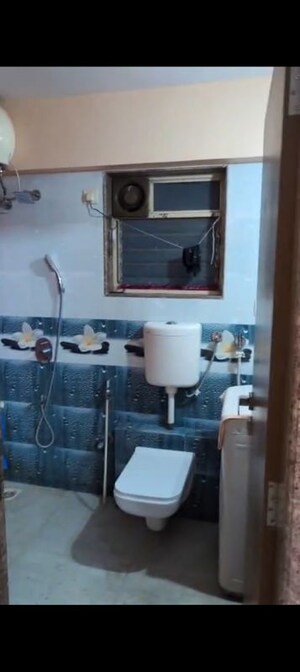 Bathroom in 2 BHK Apartment at Kanakia Spaces Niharika, Manpada – for Rent
