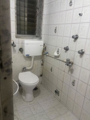 Bathroom in 2 BHK Apartment at Abrol Krishna Balaji, Malad West – for Rent
