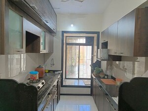 Kitchen in 2 BHK Apartment at Abrol Krishna Balaji, Malad West – for Rent