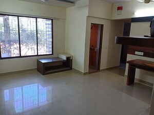 Living Room in 2 BHK Apartment at Millie Enclave, Malad West – for Rent