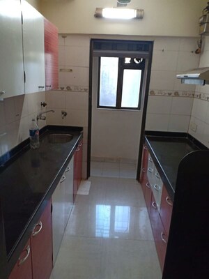 Kitchen in 2 BHK Apartment at Millie Enclave, Malad West – for Rent