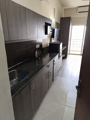 Kitchen in 1 RK Apartment at Paramount Oak, Zeta I Greater Noida – for Rent