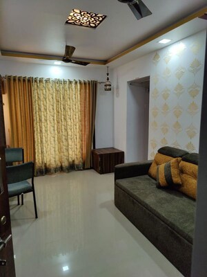 Living Room in 1 BHK Apartment at Unique Greens Ghodbunder Road, Ghodbunder Road – for Rent