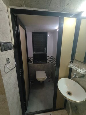 Bathroom in 1 RK Apartment at Om CHS Kandivali, Kandivali West – for Rent